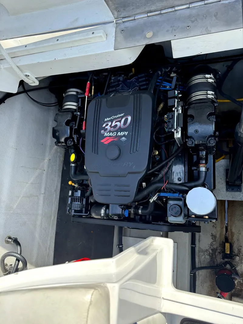 Slide: The Image of 2004 Cobalt 282 boat engine compartment with MerCruiser 350 MAG MPI engine. - 16