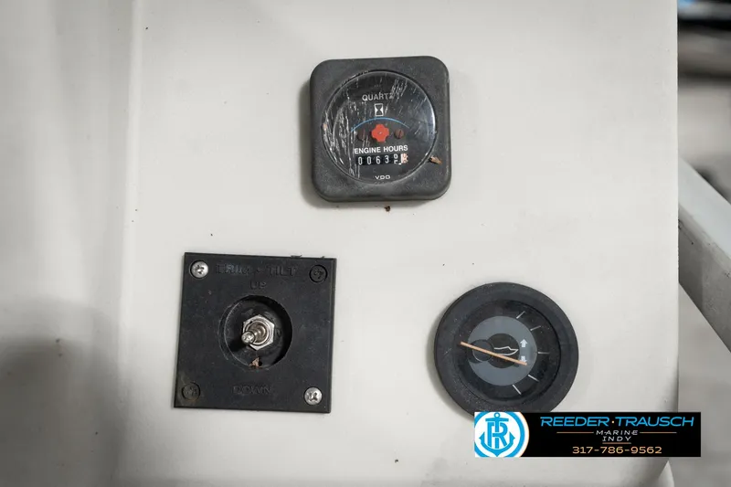 Slide: The Image of Control panel of 1989 Crest 25 Savannah II boat with engine hour meter. - 31