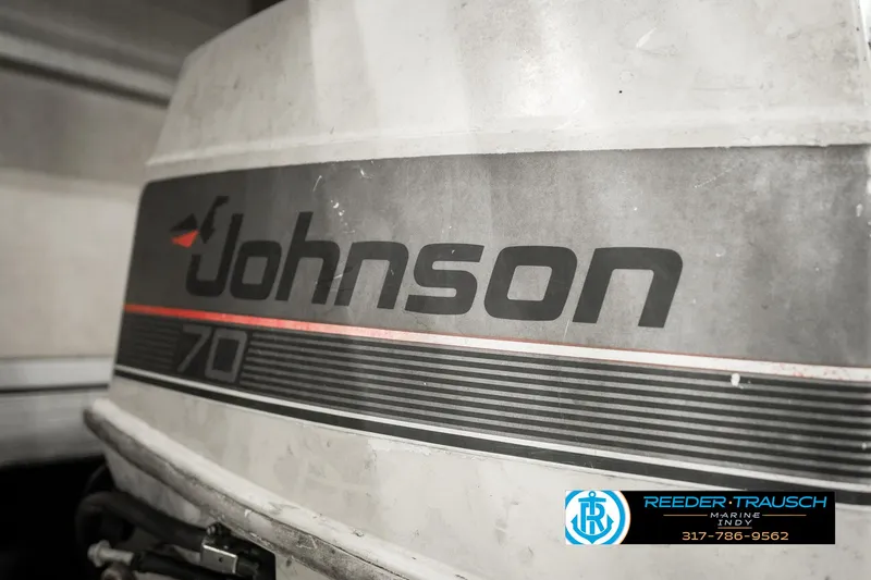 Slide: The Image of Johnson 70 outboard motor on 1989 Crest 25 Savannah II boat. - 38