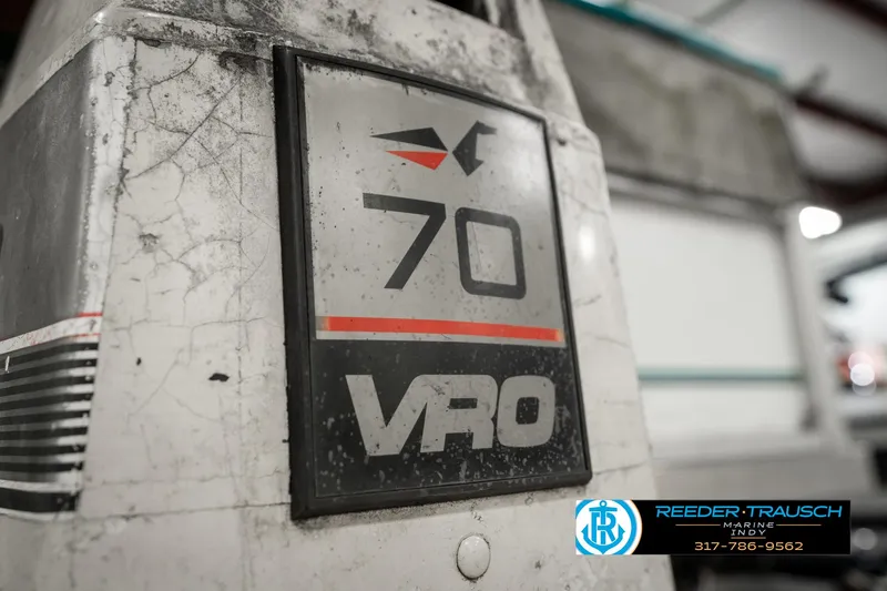 Slide: The Image of Close-up of a 1989 Crest 25 Savannah II boat engine with VRO 70 label. - 39