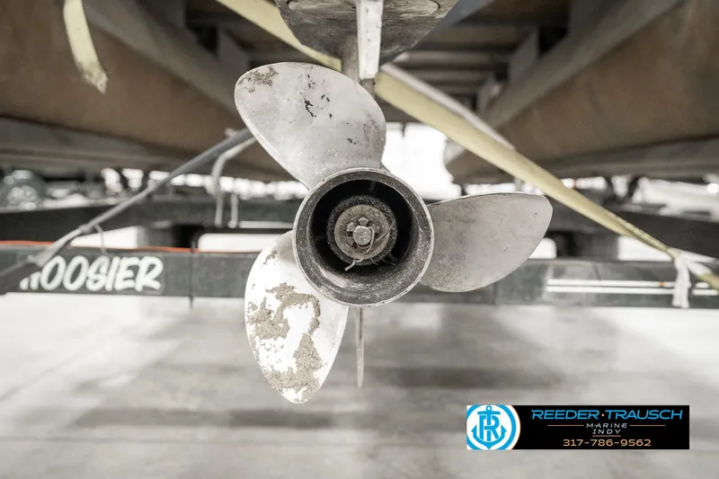 Slide: The Image of Propeller of 1989 Crest 25 Savannah II boat on trailer, close-up view. - 40