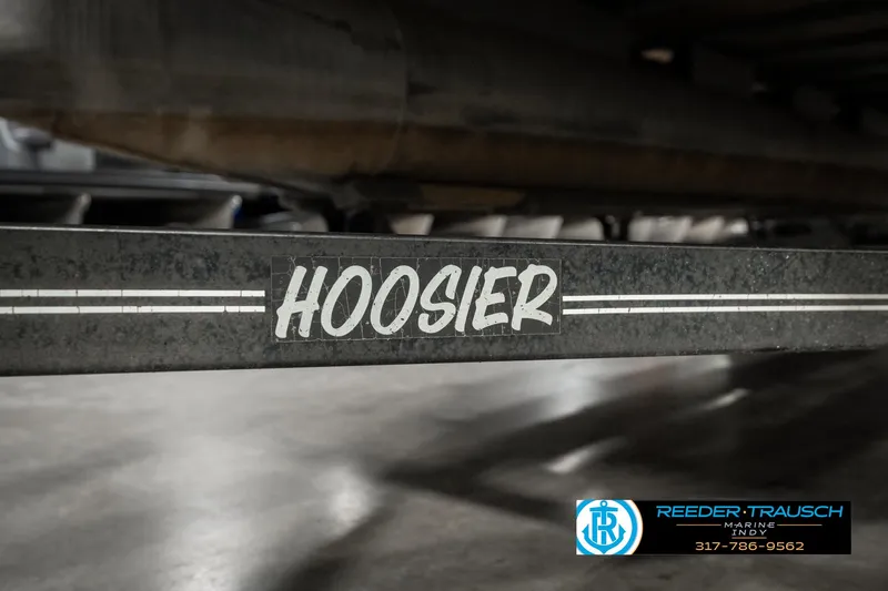 Slide: The Image of Alt text: "1989 Crest 25 Savannah II trailer with 'Hoosier' branding in a garage." - 42
