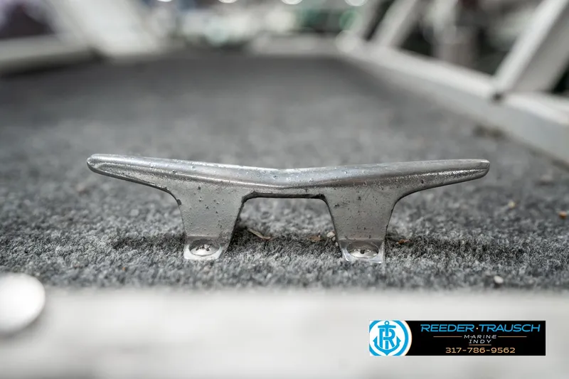 Slide: The Image of Boat cleat on carpeted deck of 1989 Crest 25 Savannah II. - 43