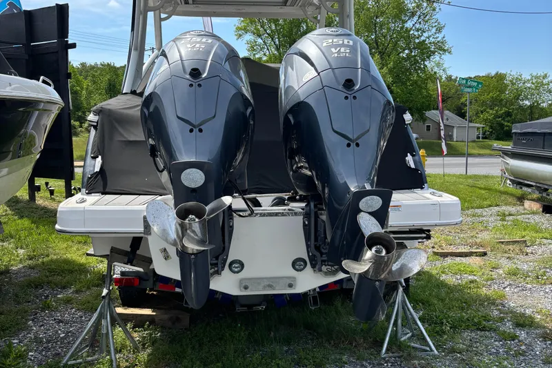 Slide: The Image of 2022 Chaparral 280 OSX boat with dual outboard engines on display. - 3