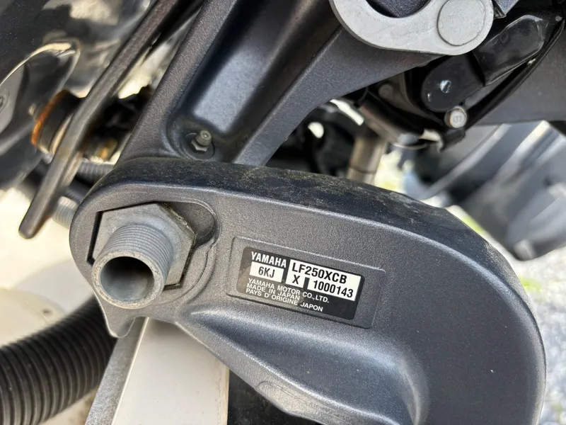 Slide: The Image of Close-up of Yamaha LF250XCB engine part on 2022 Chaparral 280 OSX boat. - 5
