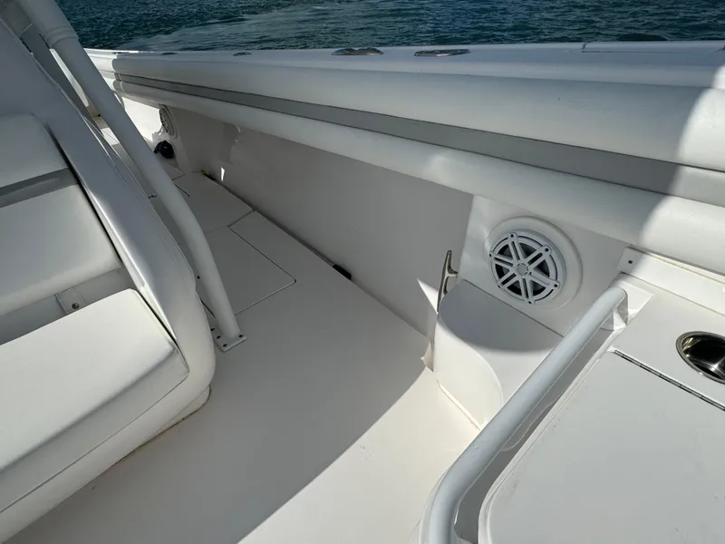Slide: The Image of 2016 Intrepid 375 CC boat interior with seating and speaker detail. - 38