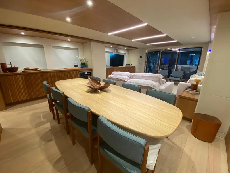 Slide: The Image of Luxurious interior of 2027 Inace Explora 90 yacht with modern dining and living area. - 19