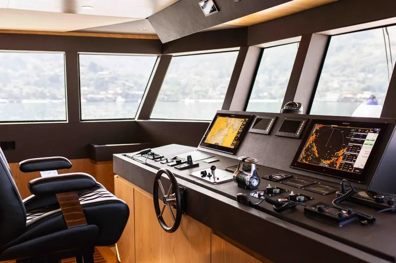 Slide: The Image of Bridge of 2027 Inace Explora 90 yacht with advanced navigation systems. - 2