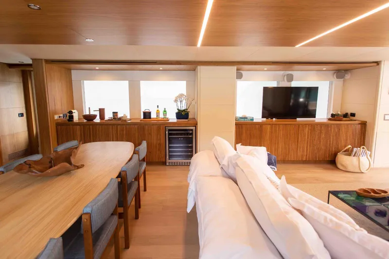 Slide: The Image of Luxurious interior of 2027 Inace Explora 90 yacht with modern dining and living area. - 22