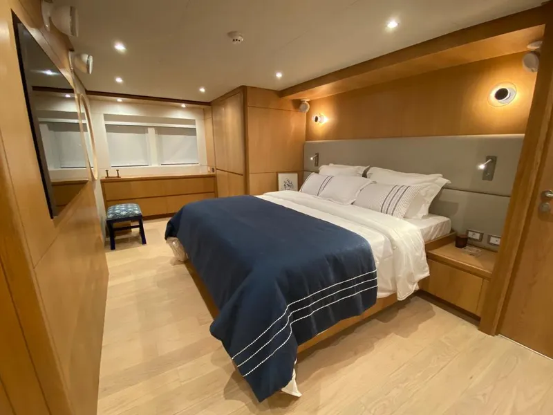 Slide: The Image of Luxurious bedroom interior on Inace Explora 90 yacht, 2027 model, featuring modern design and cozy ambiance. - 31