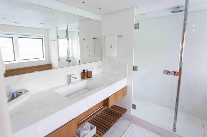 Slide: The Image of Luxurious bathroom in 2027 Inace Explora 90 yacht with modern fixtures and glass shower. - 35