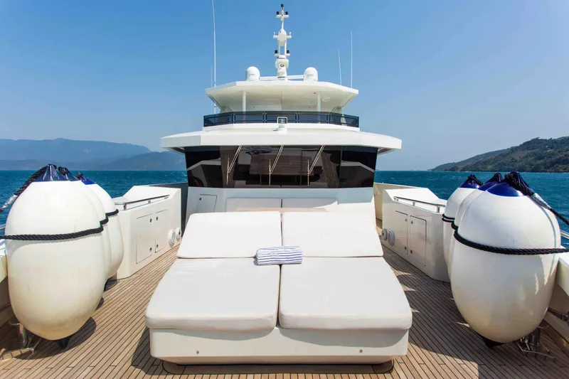 Slide: The Image of Luxury Inace Explora 90 yacht deck with sun loungers, ocean view, 2027 model. - 6