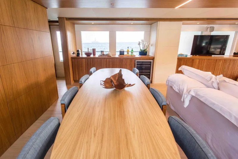 Slide: The Image of Luxurious interior of 2027 Inace Explora 90 yacht with elegant dining area and ocean view. - 24