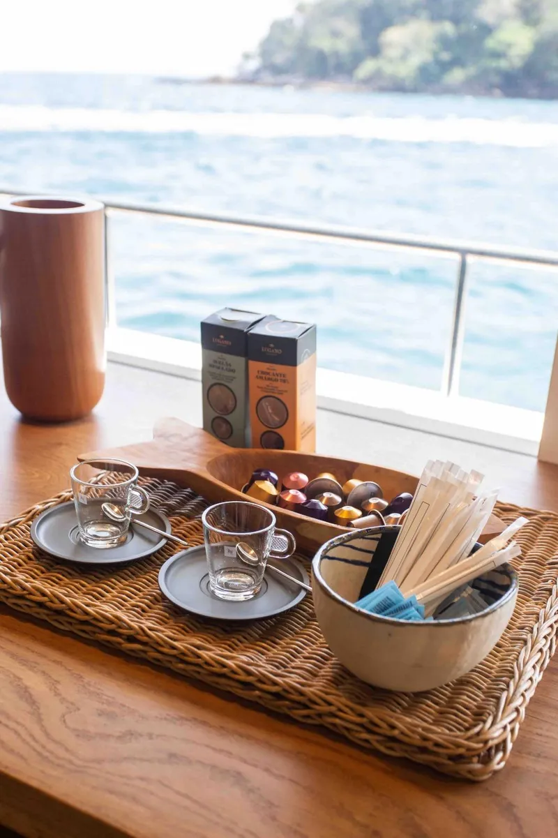 Slide: The Image of Coffee setup on Inace Explora 90 yacht, ocean view, 2027. - 25