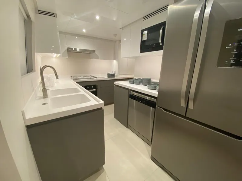 Slide: The Image of Modern kitchen in 2027 Inace Explora 90 yacht with sleek appliances and minimalist design. - 32