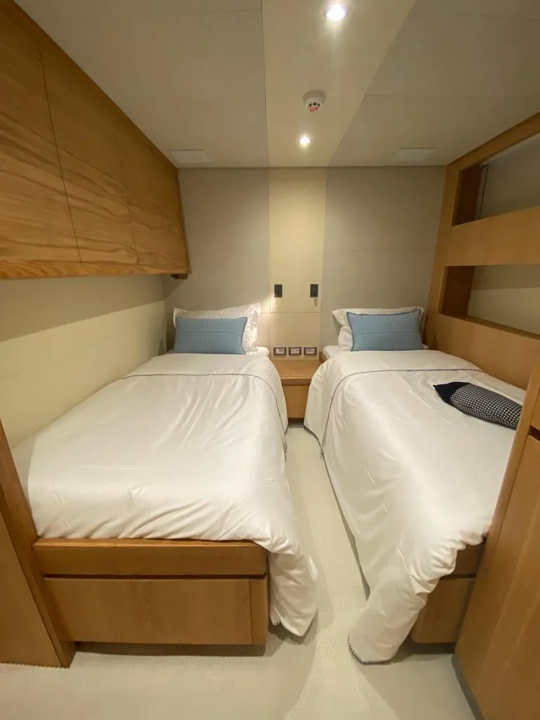Slide: The Image of Twin bedroom in 2027 Inace Explora 90 yacht, featuring modern design and cozy bedding. - 33