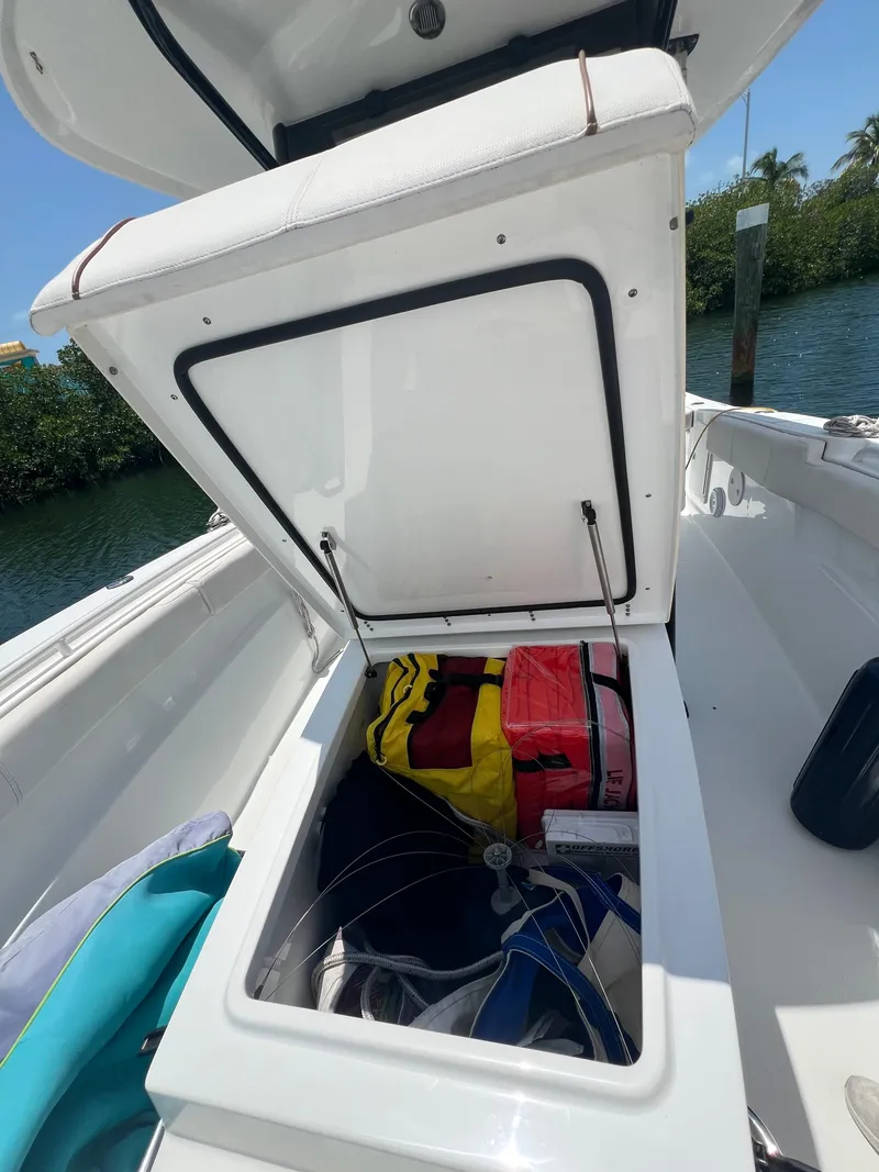 Slide: The Image of 2022 Sea Hunt Gamefish 30 Coffin Box boat console with Garmin electronics and control panel. - 14