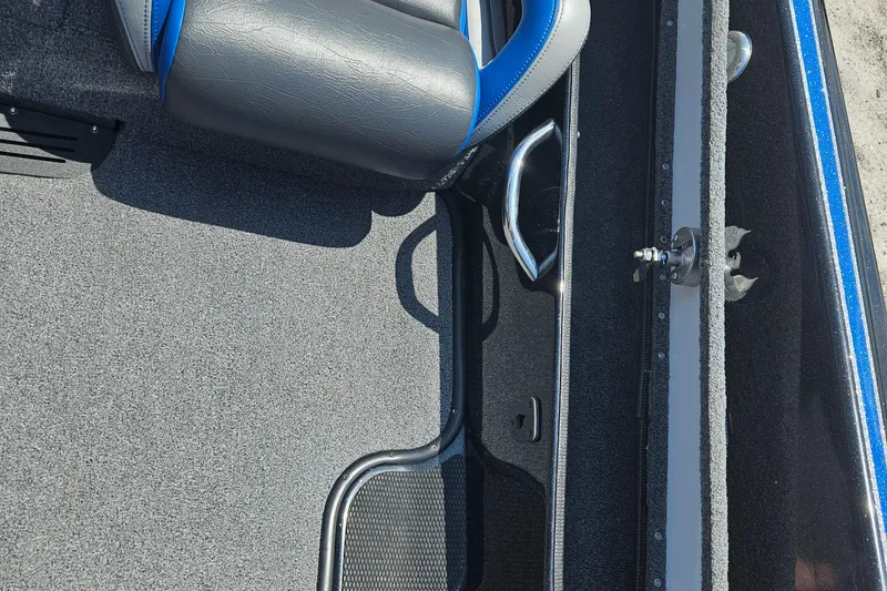 Slide: The Image of 2023 Phoenix 721 ProXP boat interior with gray and blue seating. - 21