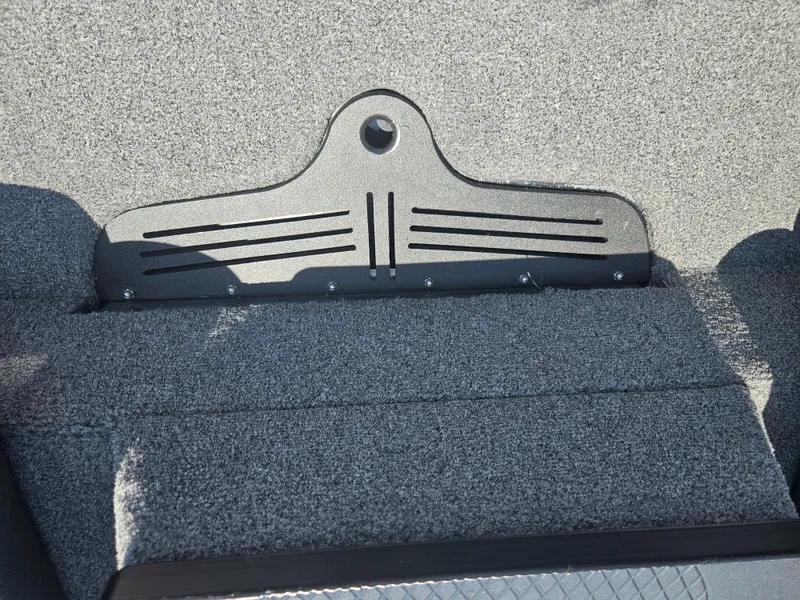 Slide: The Image of 2023 Phoenix 721 ProXP boat interior with textured gray upholstery and sleek design. - 6