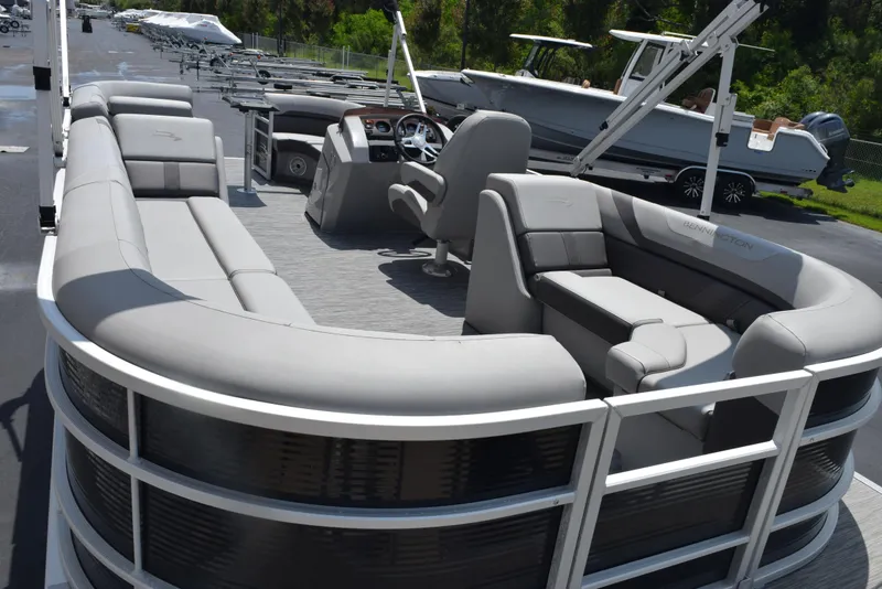 Slide: The Image of 2022 Bennington SX 23 Stern Lounge pontoon boat with spacious seating and modern design. - 7