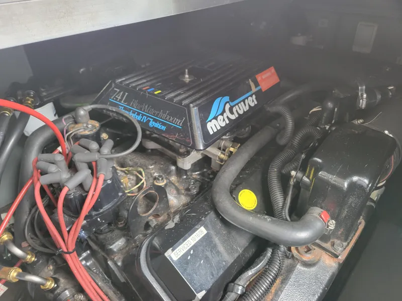Slide: The Image of Engine compartment of a 1995 Sea Ray 370 Sundancer with MerCruiser components. - 30