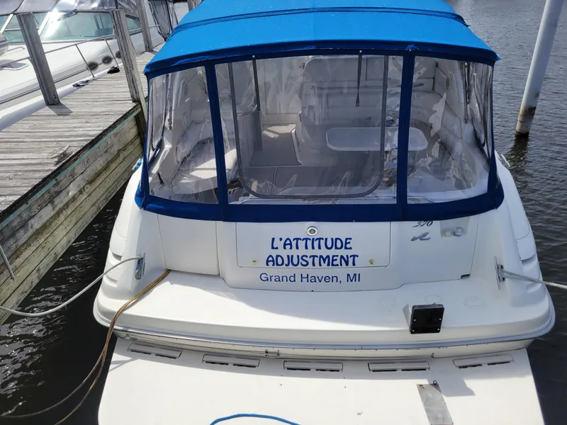 Slide: The Image of 1995 Sea Ray 370 Sundancer boat with blue canopy, docked in Grand Haven, MI. - 5