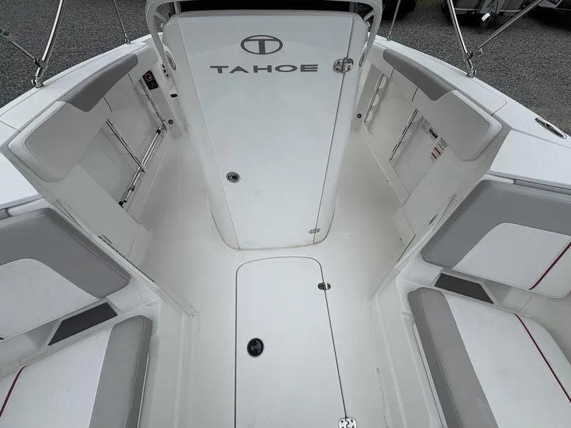 Slide: The Image of 2020 Tahoe 2150 boat interior with white seating and sleek design. - 6