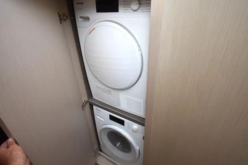 Slide: The Image of Stacked washer and dryer in Azimut Fly 68 yacht, 2024 model. - 20