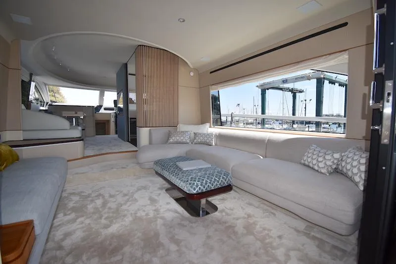 Slide: The Image of Luxurious interior of 2024 Azimut Fly 68 yacht with elegant seating and large windows. - 6