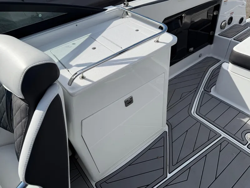 Slide: The Image of 2023 Monterey 258 Super Sport boat interior with sleek seating and modern design. - 11