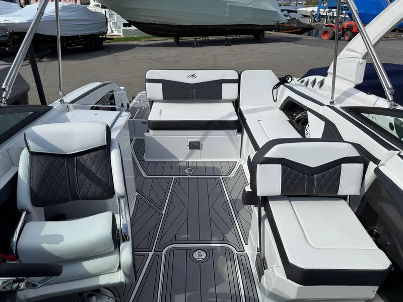 Slide: The Image of 2023 Monterey 258 Super Sport boat interior with sleek seating and modern design. - 13