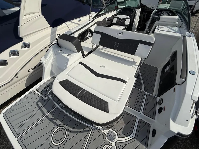 Slide: The Image of 2023 Monterey 258 Super Sport boat with sleek seating and modern design. - 14