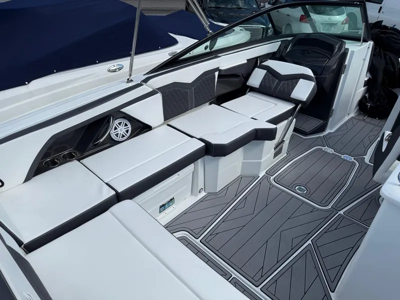 Slide: The Image of 2023 Monterey 258 Super Sport boat interior with sleek seating and modern design. - 18