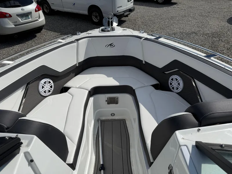 Slide: The Image of 2023 Monterey 258 Super Sport boat interior with sleek seating and modern design. - 6