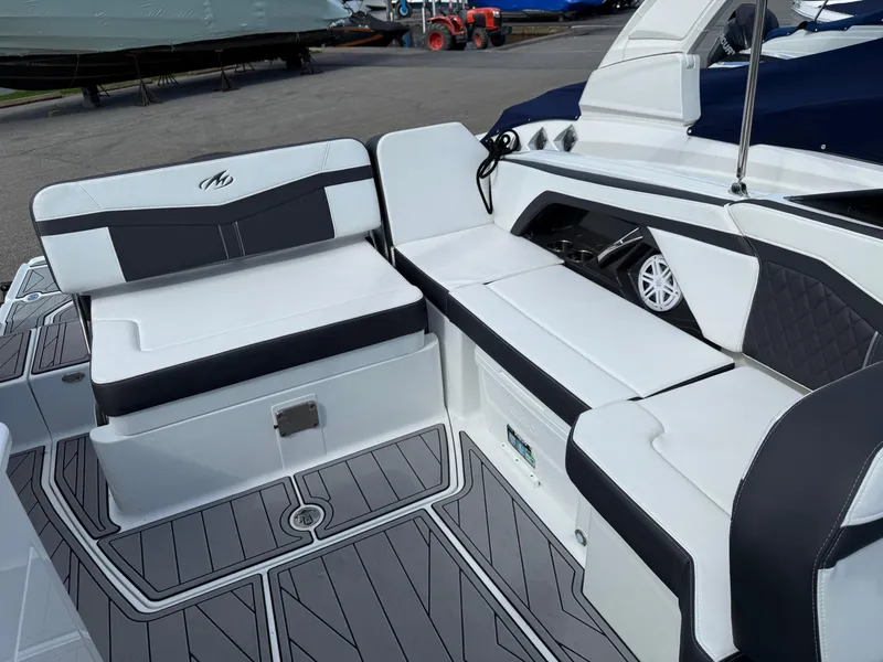 Slide: The Image of 2023 Monterey 258 Super Sport boat interior with sleek seating and modern design. - 8