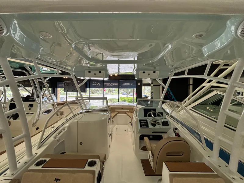 Slide: The Image of 2025 Sea Pro 240 Dual Console boat interior with modern design and spacious seating. - 2