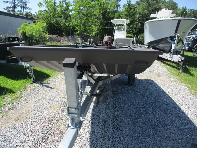 Slide: The Image of 2025 Alweld 1548 Marsh boat on trailer, parked outdoors. - 7