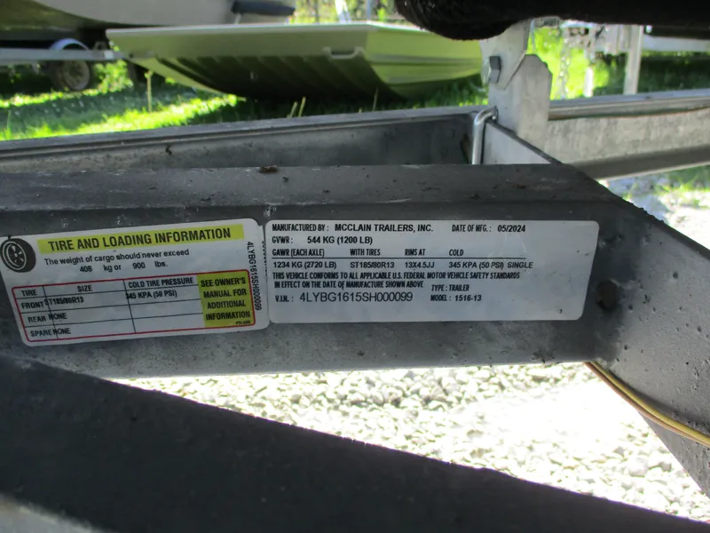 Slide: The Image of Trailer label for Alweld 1548 Marsh, 2025 model, showing tire and loading information. - 8