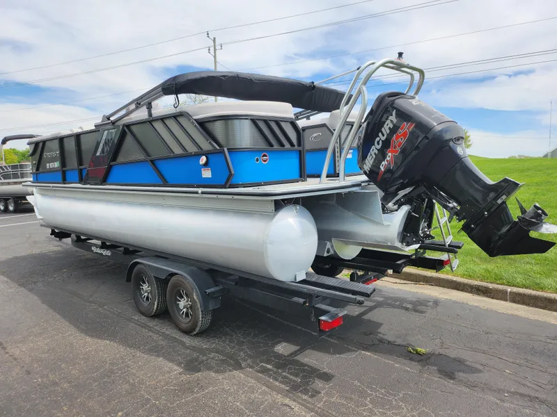 Slide: The Image of 2017 Crest Caliber 230 SLC pontoon boat on trailer with Mercury outboard motor. - 3