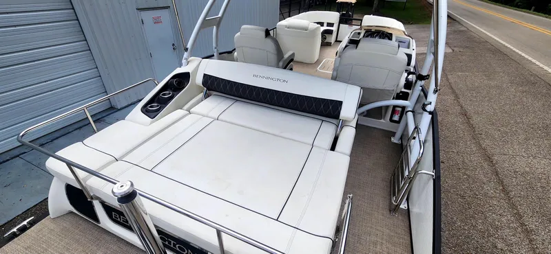 Slide: The Image of 2020 Bennington R 25 RSBA pontoon boat with spacious seating and sleek design. - 13