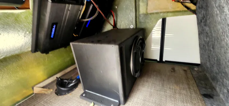 Slide: The Image of Audio equipment setup in a 2020 Bennington R 25 RSBA boat interior. - 18