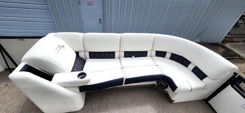 Slide: The Image of 2020 Bennington R 25 RSBA boat seating, white and black upholstery, outdoor setting. - 7