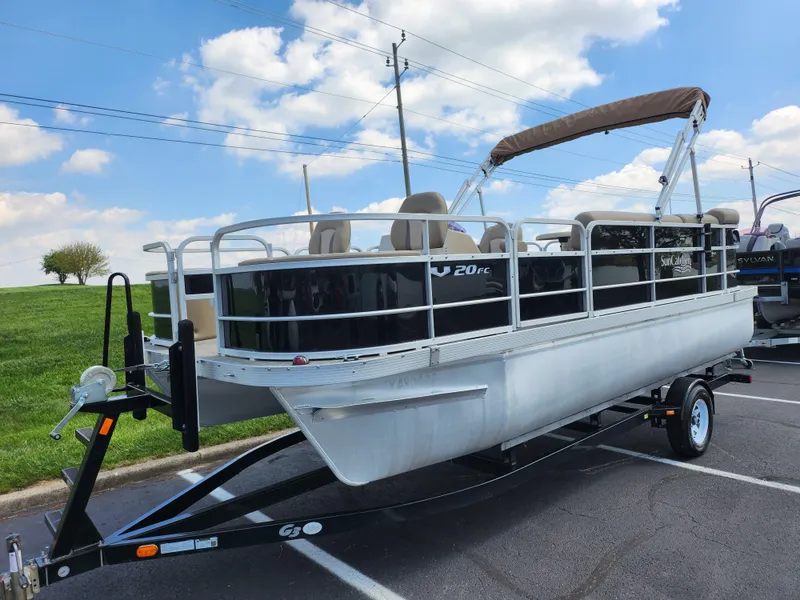 Slide: The Image of 2016 SunCatcher V20 Fish & Cruise pontoon boat on trailer, parked outdoors. - 5