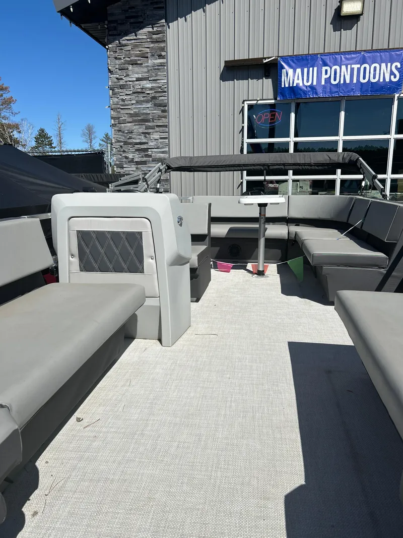 Slide: The Image of 2025 Custom Maui 210 Cruise pontoon boat with spacious seating and modern design. - 3