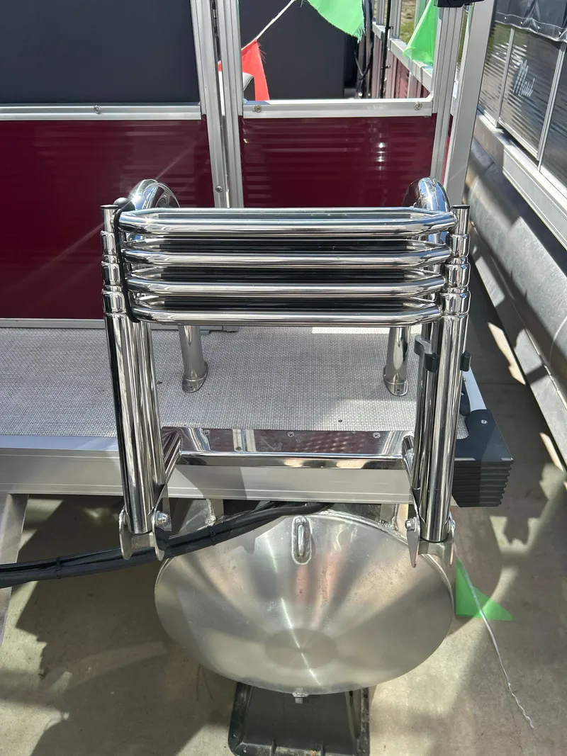 Slide: The Image of Stainless steel ladder on a 2025 Custom Maui 210 Cruise boat. - 8