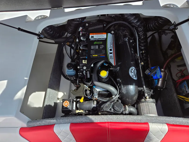 Slide: The Image of 2014 Glastron GT 185 boat engine compartment with MerCruiser 3.0 MPI engine. - 23