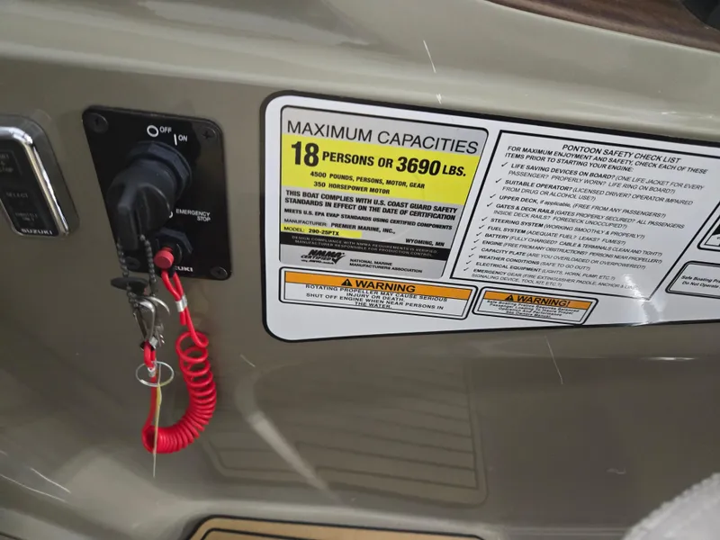 Slide: The Image of 2013 Premier 290 Grand Entertainer capacity label, 18 persons or 3690 lbs, safety instructions. - 26