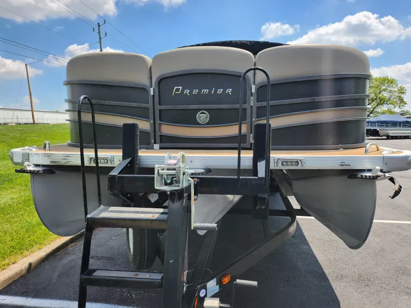 Slide: The Image of 2013 Premier 290 Grand Entertainer pontoon boat on trailer, sunny day. - 7