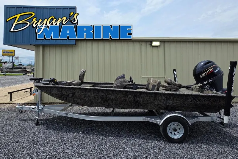 Slide: The Image of 2025 Xpress XP180 boat on trailer at Bryan's Marine dealership. - 0