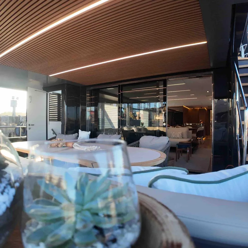 Slide: The Image of Luxurious interior of 2027 Inace AVENTURA 106 yacht with modern decor and seating area. - 10